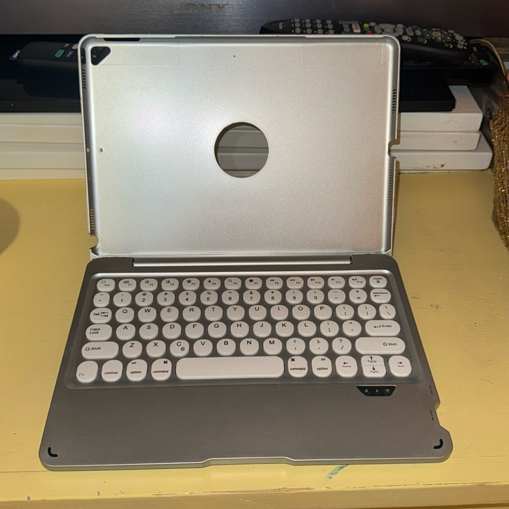 Silver IPad case with keyboard.